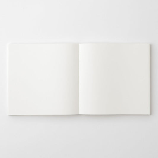 MD Notebook Cotton A5 Square opened flat to an untouched blank two-page spread.