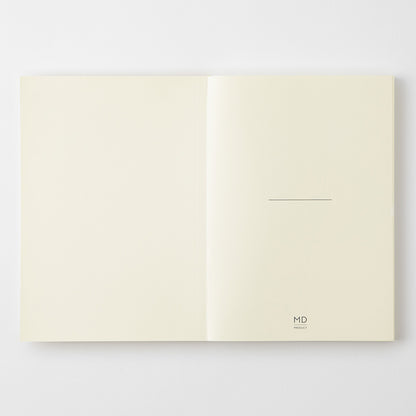 Open notebook with a minimalistic design on a light gray background