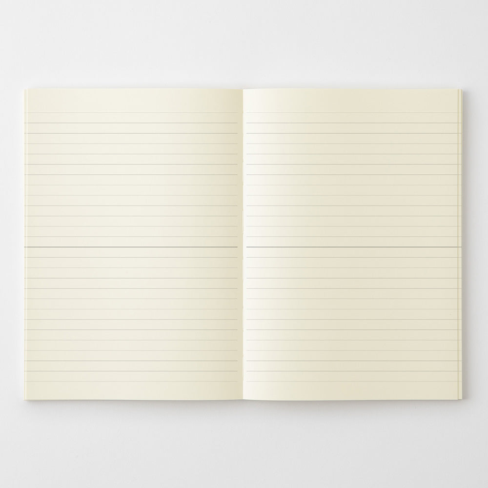 Open notebook with lined pages on a light gray background