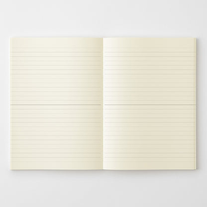 Open notebook with lined pages on a light gray background