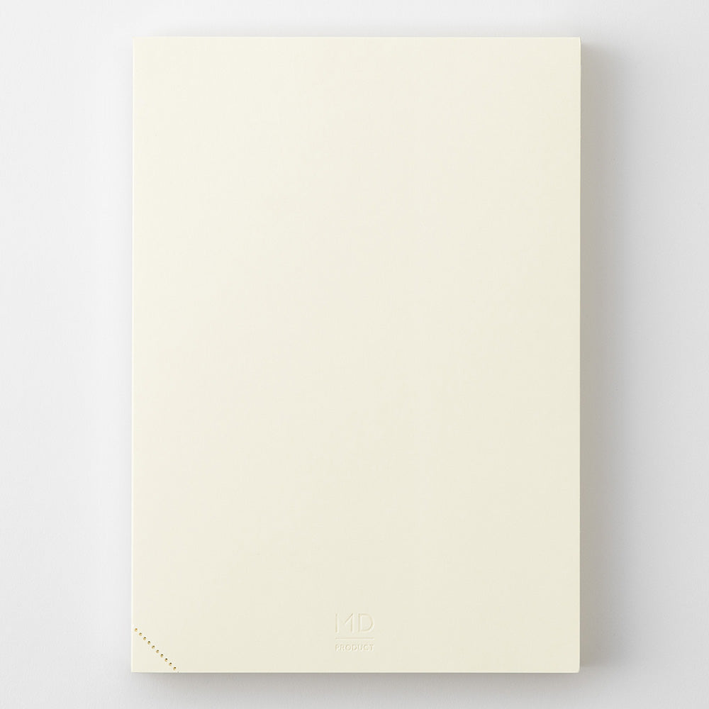 Beige Midori notebook on a white background