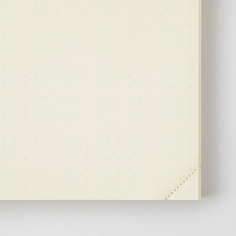Close-up of a beige textured surface with a subtle pattern