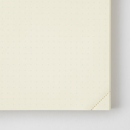 Close-up of a beige textured surface with a subtle pattern