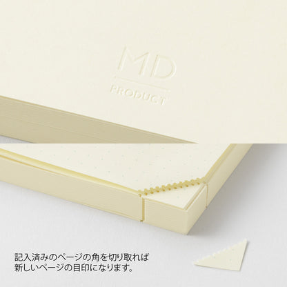 Beige notebook with a corner cutout feature on a light gray background