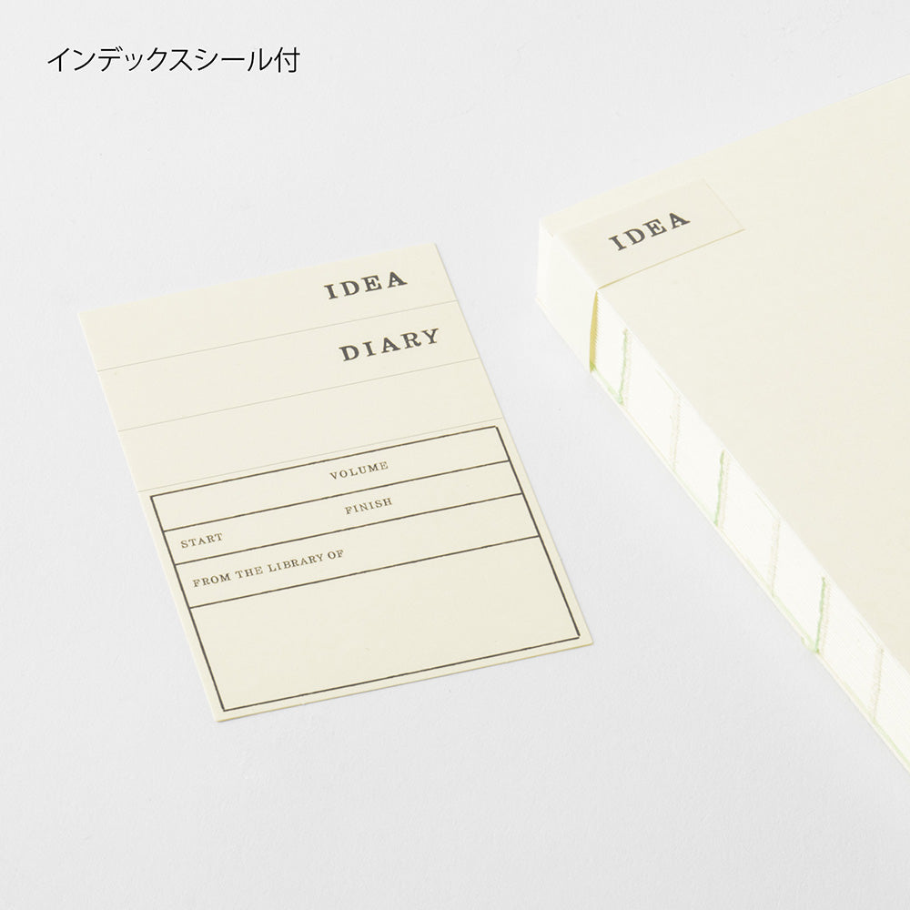 Idea Diary with a white cover on a light gray background