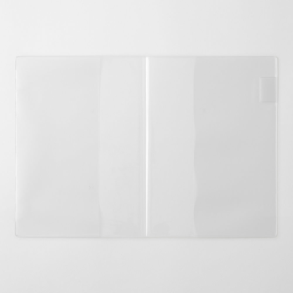 Two white square tiles on a light gray background
