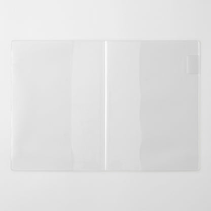 Two white square tiles on a light gray background