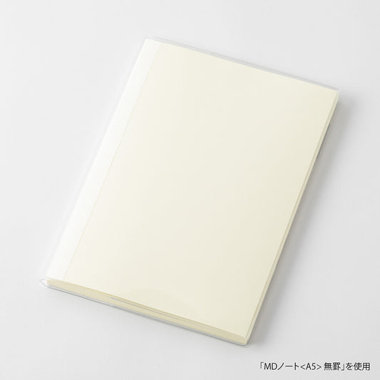 White notebook on a light gray background