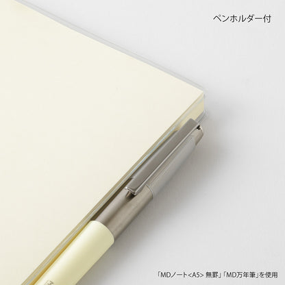 Pen holder attached to a notebook on a white background