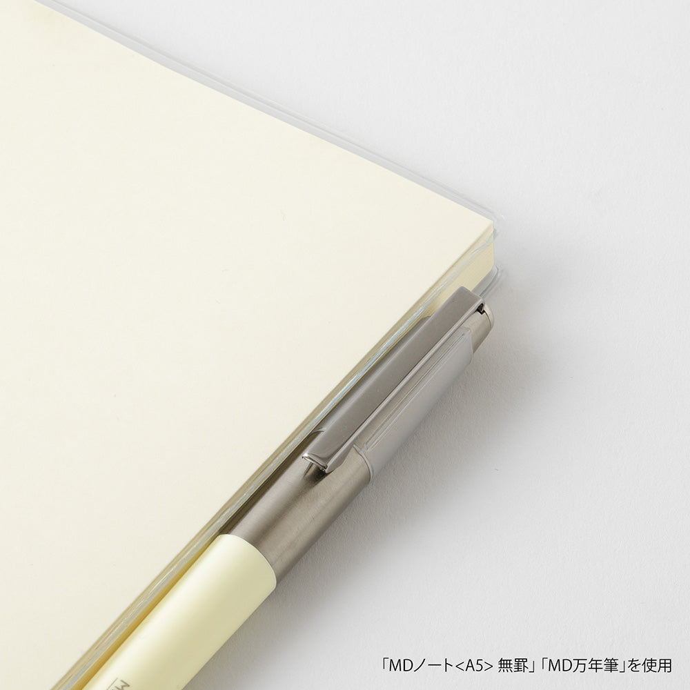 Pen and notebook on a white background