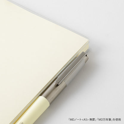 Pen and notebook on a white background