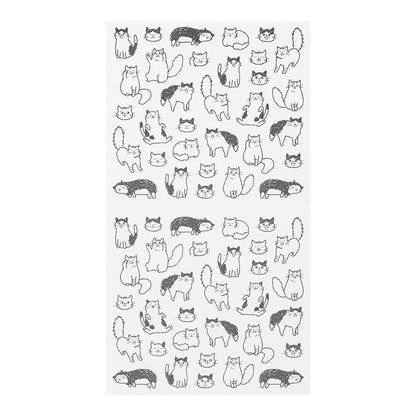Sheet of black and white cat stickers on a white background