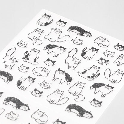 Sheet of black and white cat illustrations on a white background