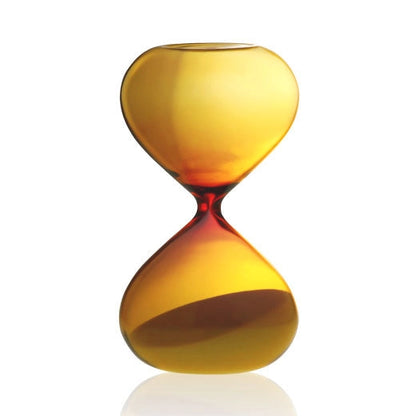 Hourglass-shaped vase with a gradient from yellow to red on a white background